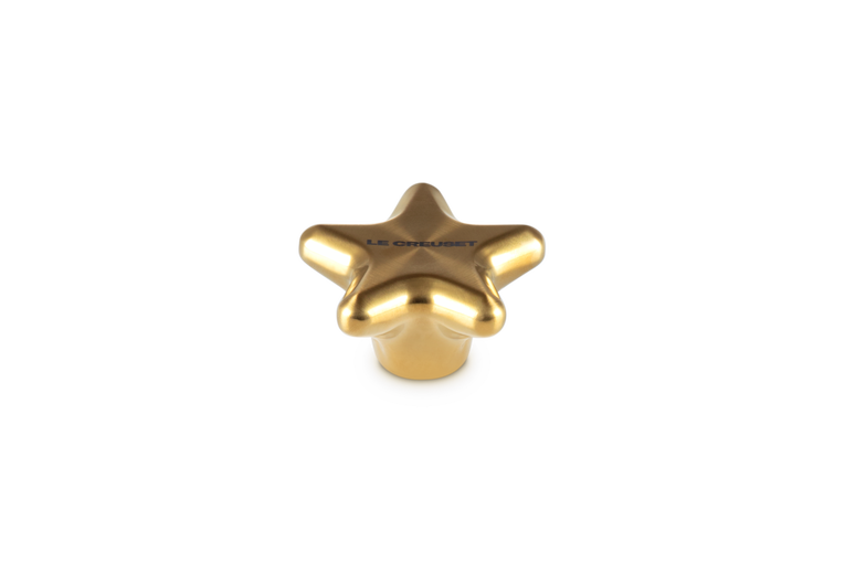 Le Creuset Goldfarbener Sternknopf